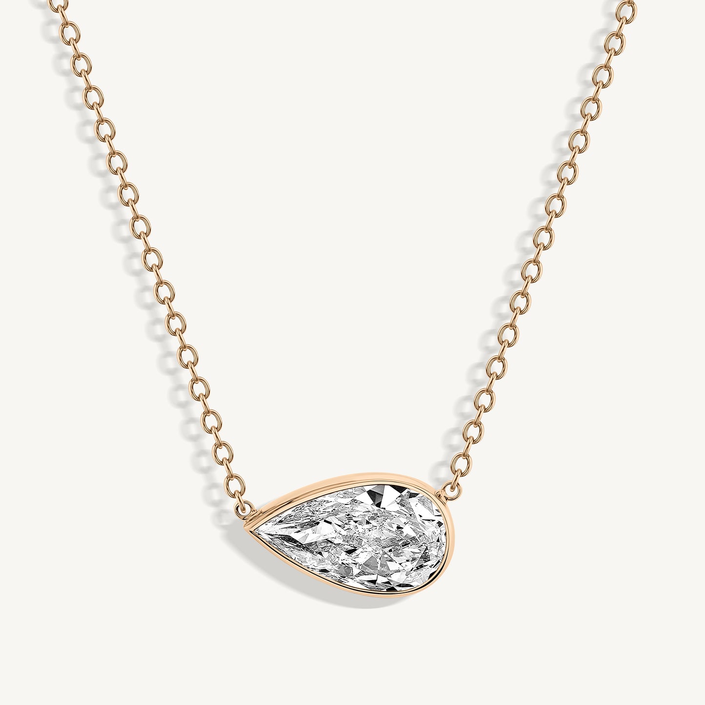 East West Pear Diamond Bezel Set Pendant