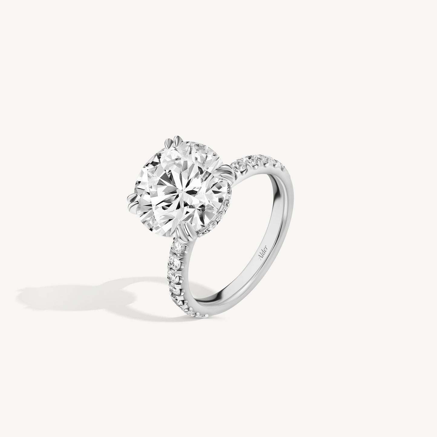 
                  
                    Round Brilliant Cut Solitaire Double Claw Engagement Ring
                  
                