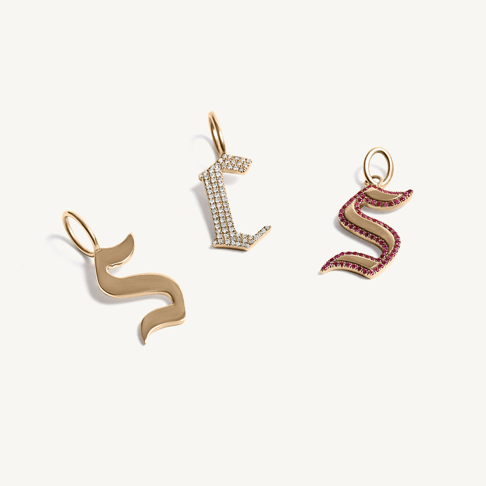 
                  
                    Solid Gold Gothic Initial Charm
                  
                