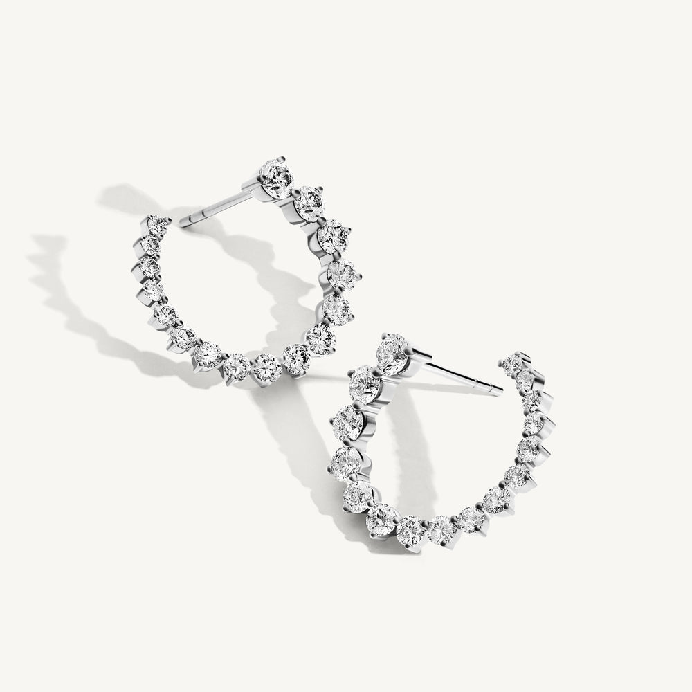 
                  
                    Graduating Round Diamond Open Hoop Earrings
                  
                