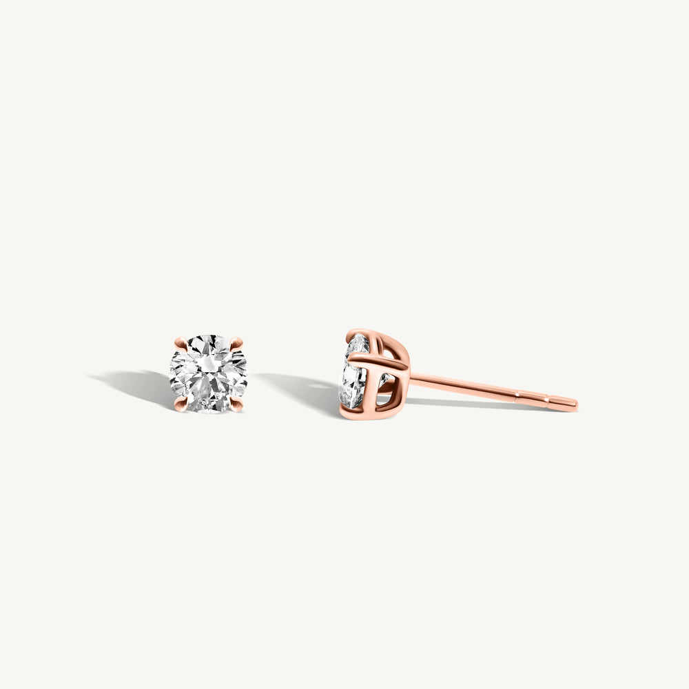 
                  
                    Round Diamond Stud Earrings
                  
                